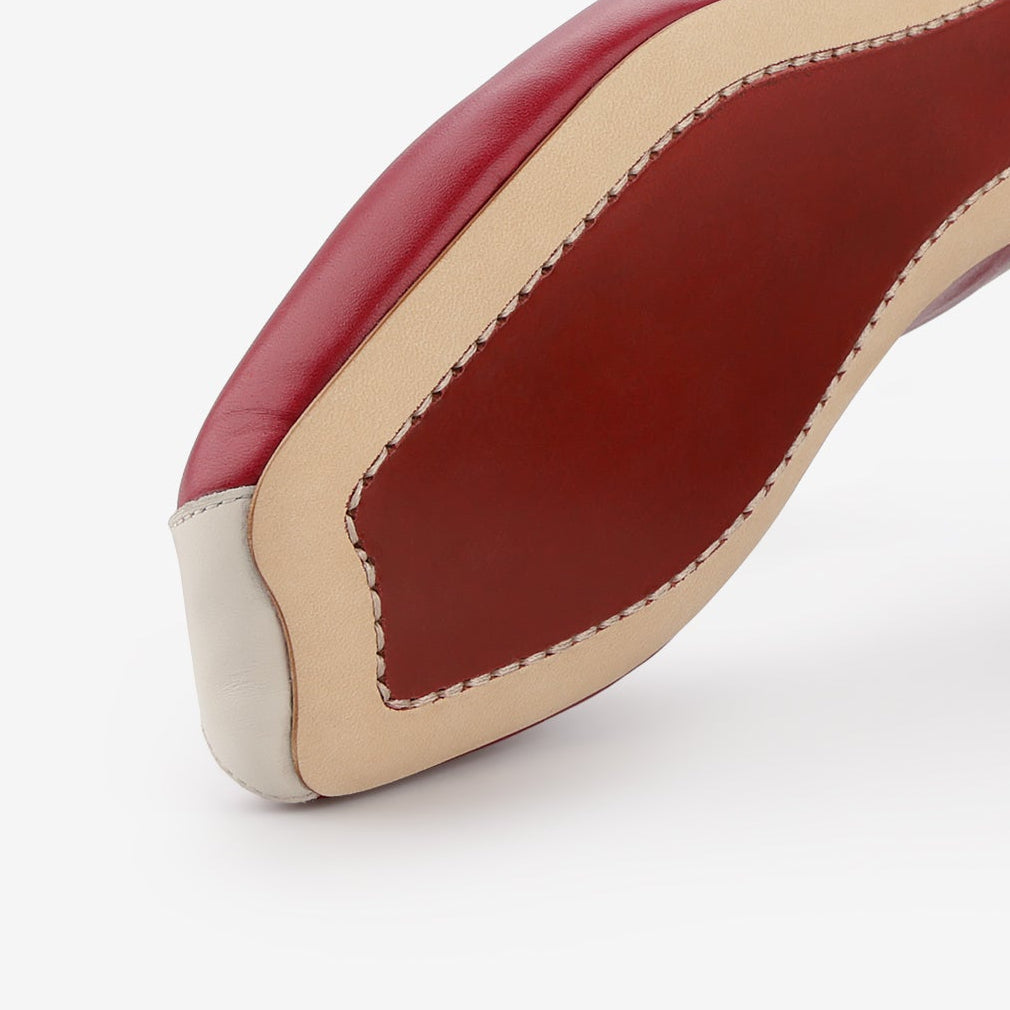 Red and white shoes on a white background