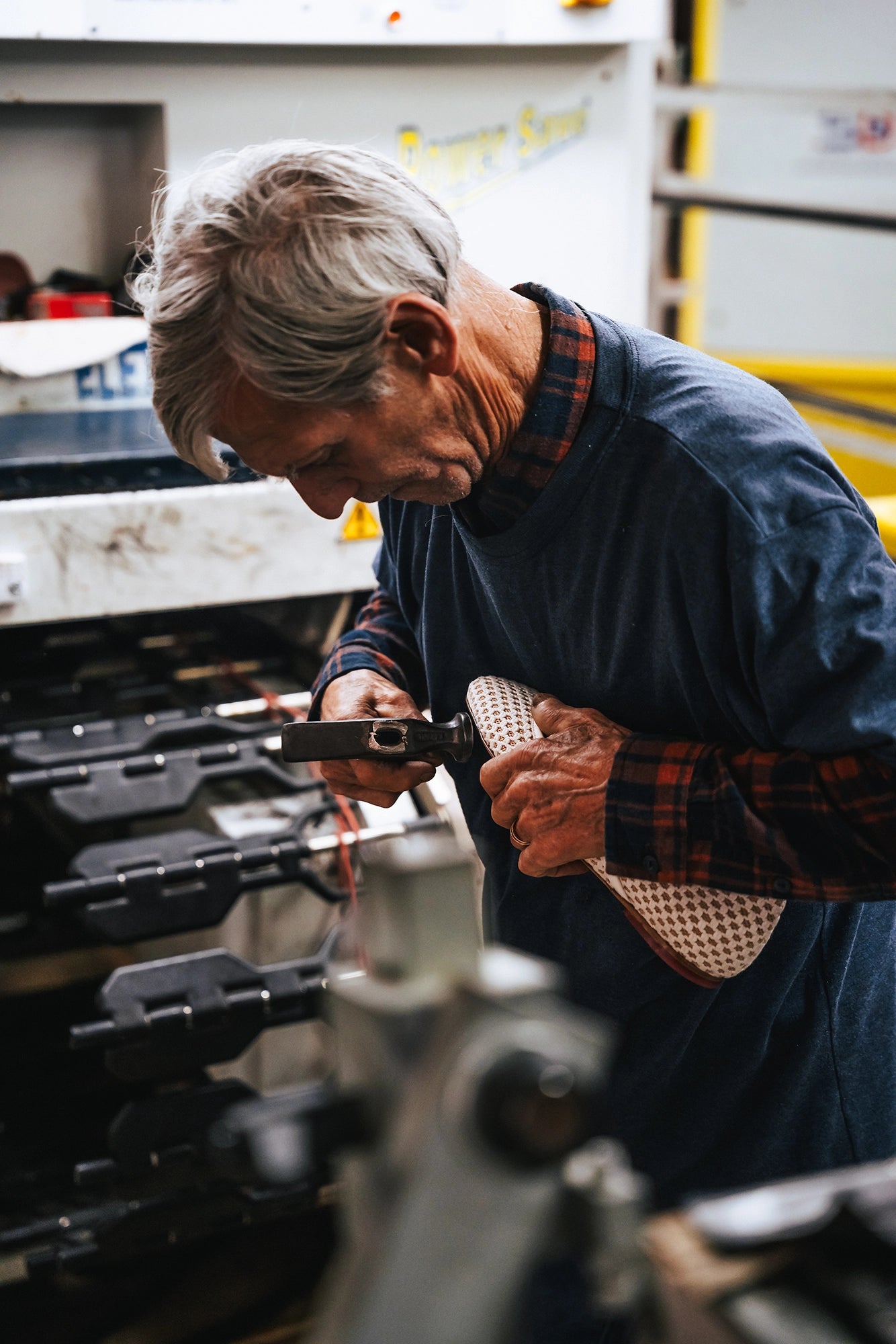 Man working on machinery in a workshop