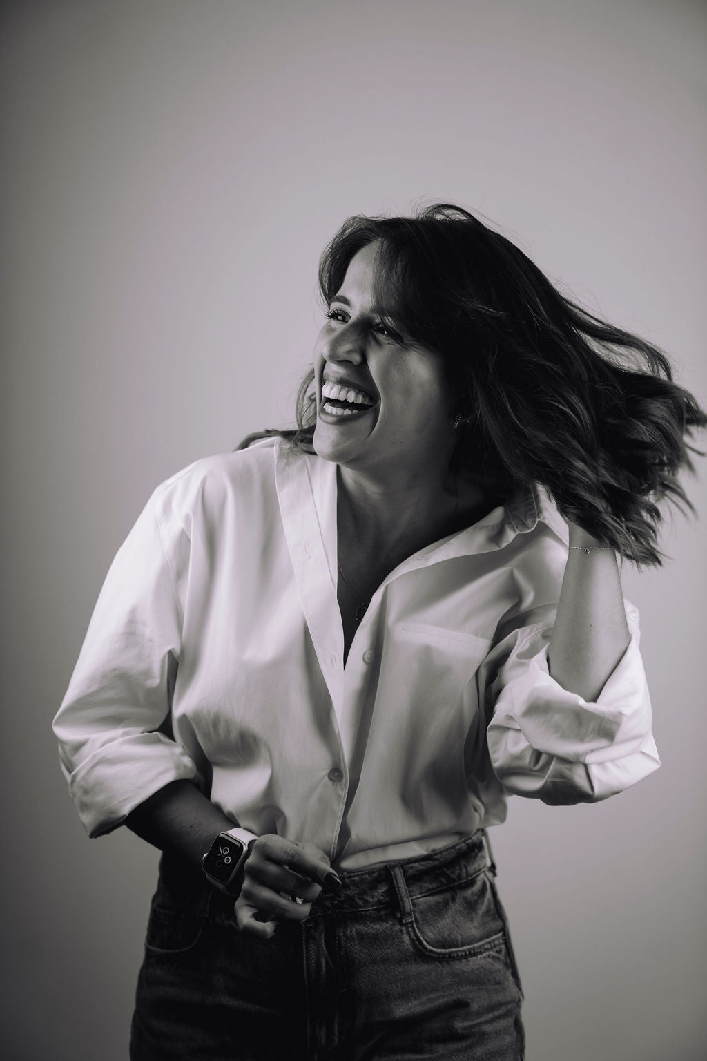 TUAS founder laughing with a plain background